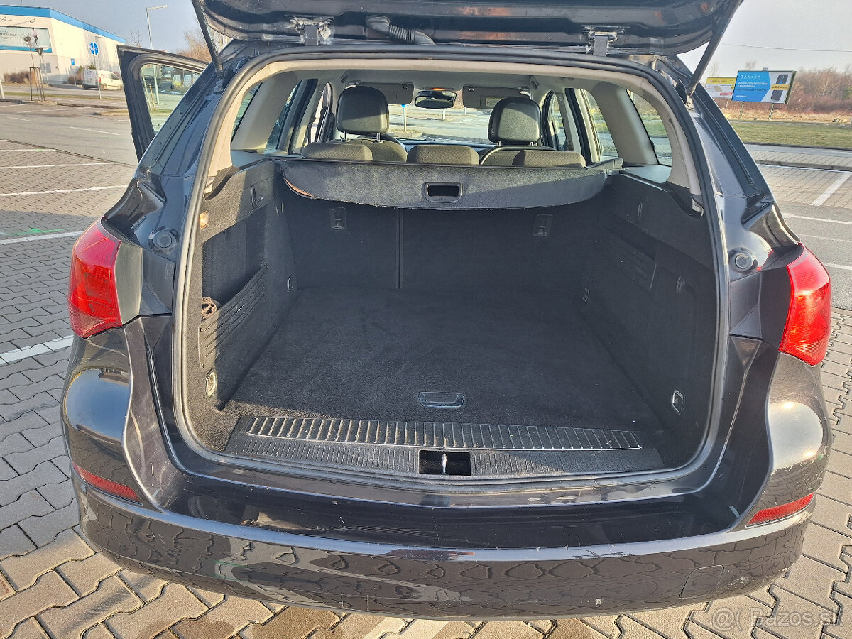 Opel astra J combi - 9