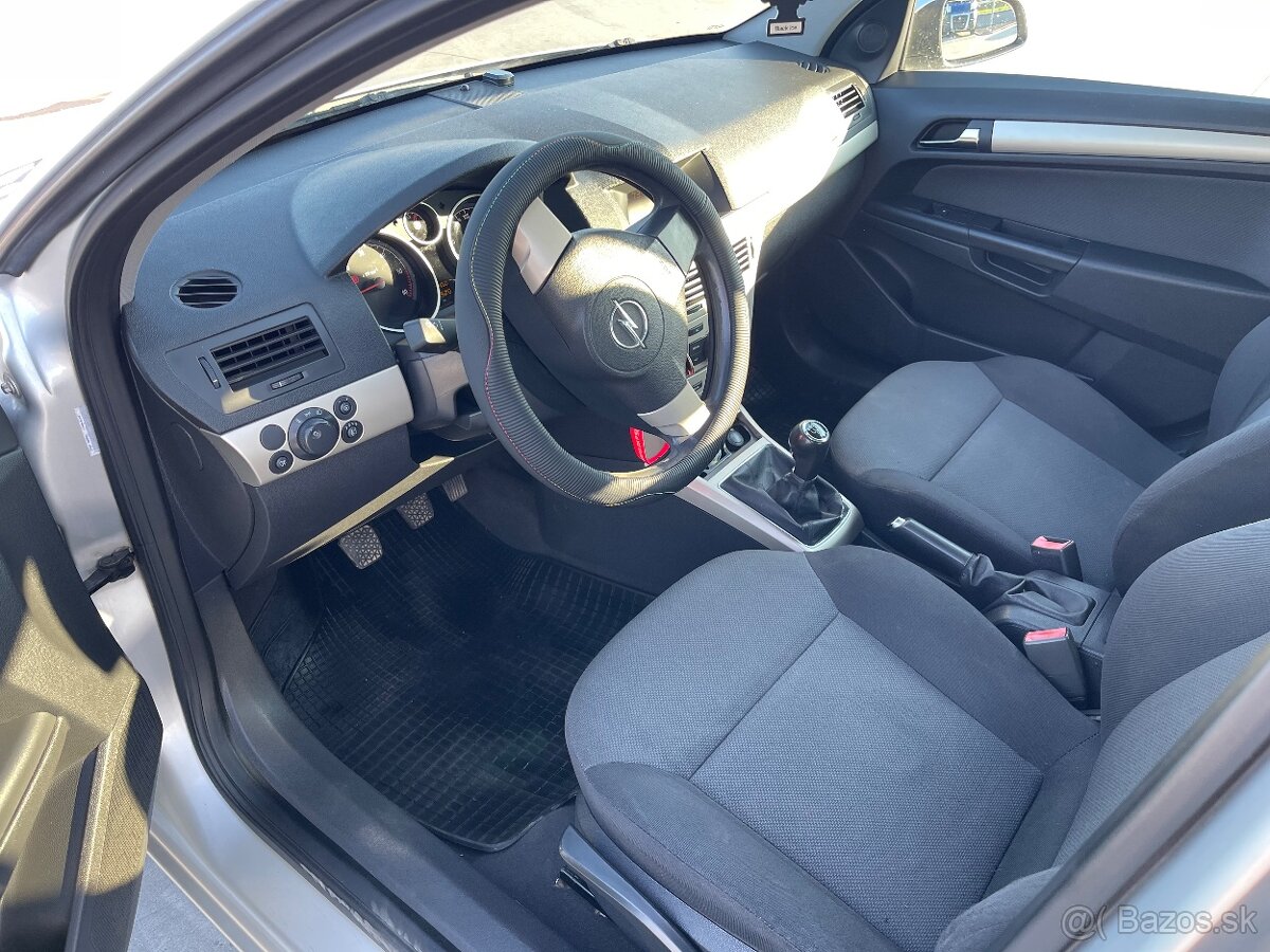 Opel astra H 1.9cdti - 9