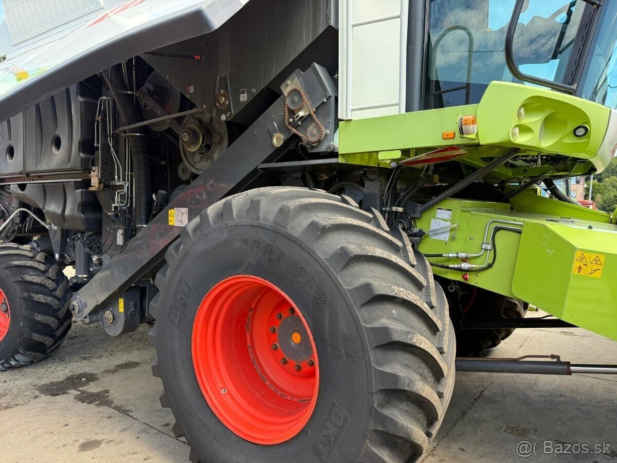 Sklízecí mlátička Claas Lexion 580 s žací lišta V750 dovezen - 9