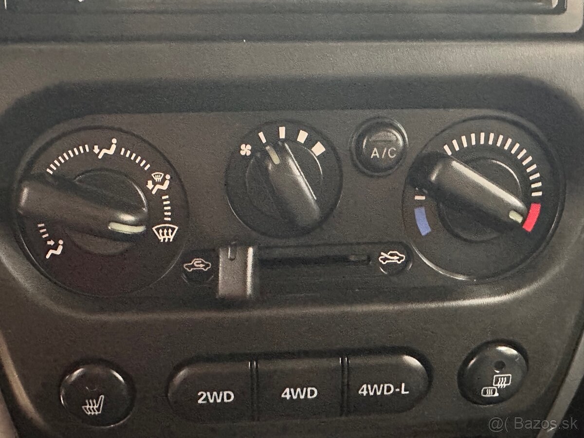 Suzuki Jimny 1.3i - 9