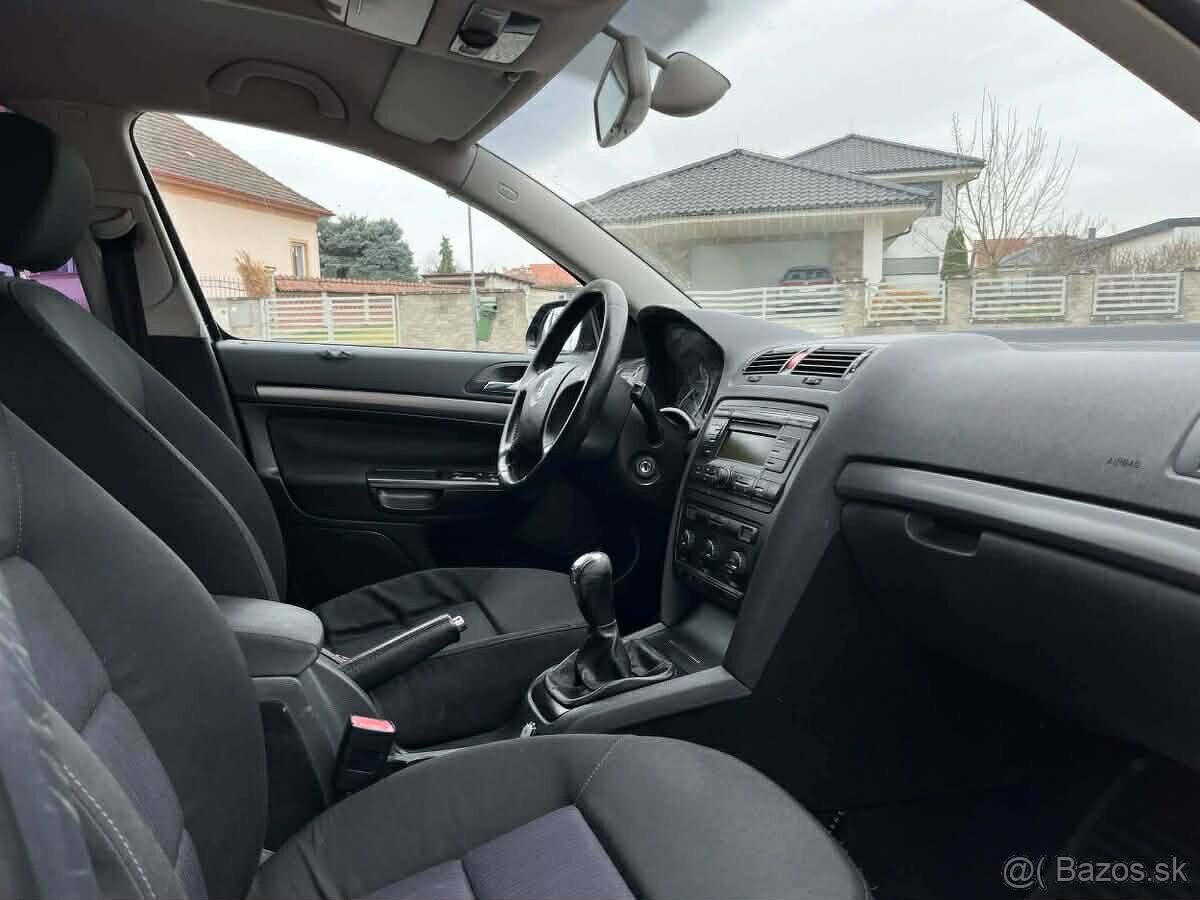 Škoda Octavia 2 Combi 1.6 benzín 75Kw M5 - 9