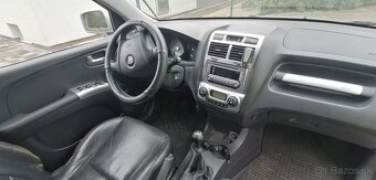 Kia sportage II - 9