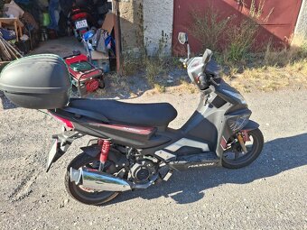 Maxon 125 - 9