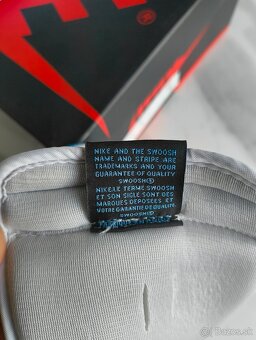 Air Jordan 1 High University Blue - 9