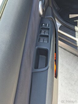 Nissan Tiida 1.6 - 9