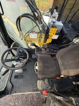 Kolový bagr KOMATSU PW148-11 - 9