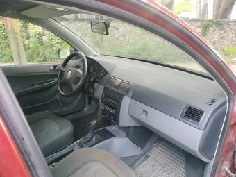 Škoda Fabia 1.4i 50kw M5 ROK 2003 - 9