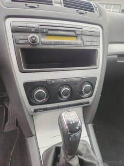 Skoda octavia 1.6tdi 77kw combi 2012 - 9