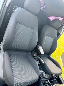 Opel Corsa D 1.2i - 9