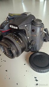 Predám fotoaparát Nikon D7000 + objektív 50mm - 9