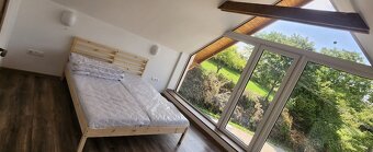 Moderná rekreačná novostavba vo vidieckom štýle - 9