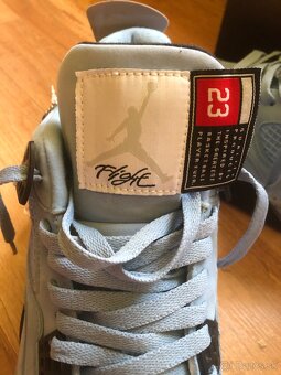 Nike Air Jordan 4 UNC - 9