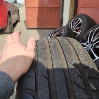 245/45 R18 100W - 9