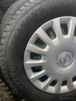 4x100 R14 5,5J ET39 Opel Corsa D + 185/70 R14 GoodYear - 9