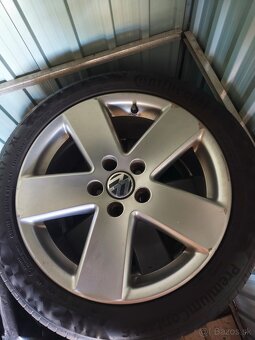 VW Passat 1,6 TDI blue motion 2010 - 9