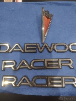 Predám stredové puklicky, volant a manuál na Daewoo Racer - 9