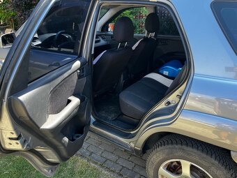 Sportage 2,0i ,4x4 - 9