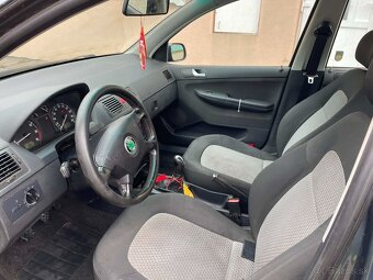 Škodu Fabia Combi 1.2 (47 kW) R.v 2003 - 9