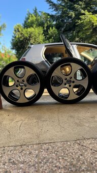 ORIGINÁLNE DISKY Z ĽAHKÝCH LIATIN GOLF GTI 245/45/18 4x18" - 9