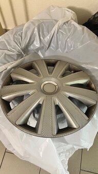 Sada letných a zimných Pneu s plechovými diskami 215/70 R16 - 9