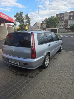 Predám mitsubishi lancer - 9
