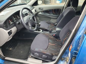 Nissan Almera 1,5 - 9