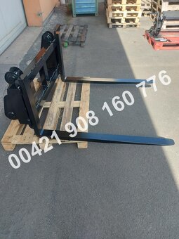 Predám nový rýchloupínač + paletizačné vidly na Komatsu WB - 9