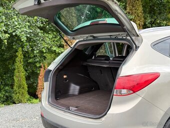 Hyundai ix35 Hnedy interier (polokoza) - 9