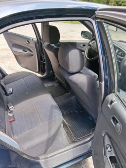Mazda 323 - 9