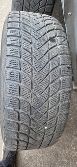 Predám zimný komplet na audi. - 9