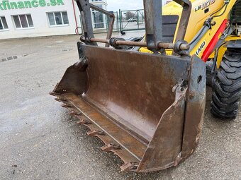 NEW HOLLAND traktor báger 2006 VIN 028 - 9