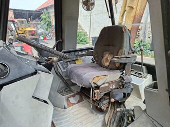 CATERPILLAR 428B 4X4 - 9