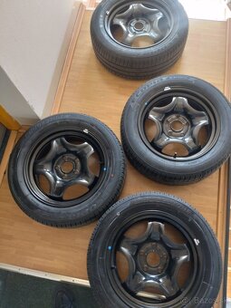 plechové disky Toyota Corolla R16 - 9