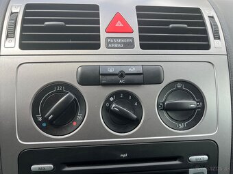 VW Touran 1,6 - 9