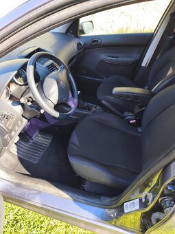 peugeot 206+ 1,4 55kw - 9