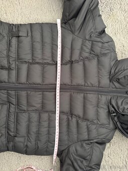 Damska zimná bunda značky The North face - 9