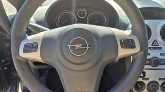 Opel Corsa 1.2i M5 59 kw SR - 9