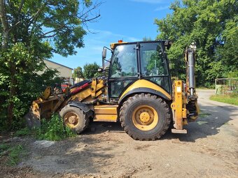 CATERPILLAR 442 E 4X4 - 9