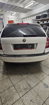 Dvere octavia 2 biela farba - 9
