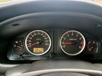 Nissan Almera N16 Hatchback (2003) - 9