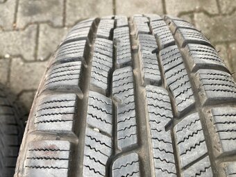 Predám sadu zimných kolies s puklicami na Ford Fiesta R14 - 9