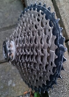 11 koliesko Shimano SLX CS-M7000 - 9