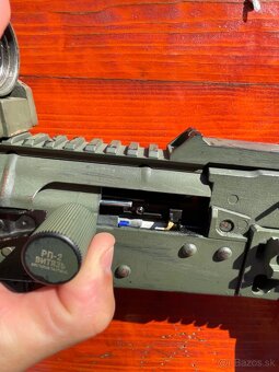 AK-105 - 9