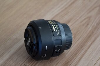 Nikkor 35 mm AF-s 1,8G nikon - clona krytky vrecko + filter - 9