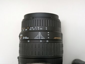 Canon EOS s objektívom a filtrom - 9