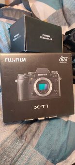 Fujifilm XF 18-55mm F2.8-4 LM OIS a Fujifilm XF 35mm f1.4 - 9