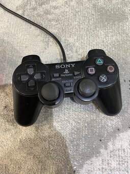 PlayStation 2 Slim - 9