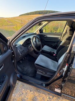 Suzuki Swift 1.3 - 9