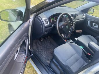 Škoda Roomster 2007 1.2htp - 9