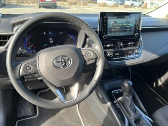 Toyota Corolla sedan 1.8 Hybrid e-CVT Comfort Tech Style - 9